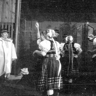 Traditional swordplay demonstration with historical attire.