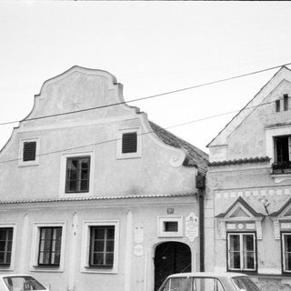 Traditional European townhouses with gabled facades.
