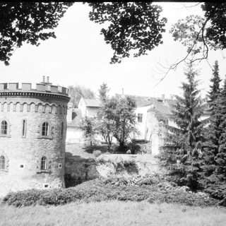 Historic stone tower with crenellated roof.