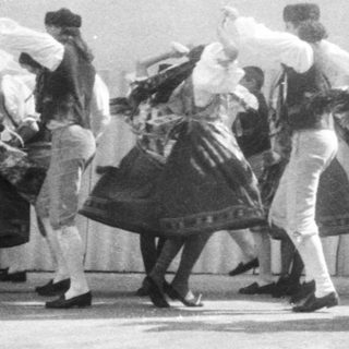 Traditional folk dance performance with colorful costumes.