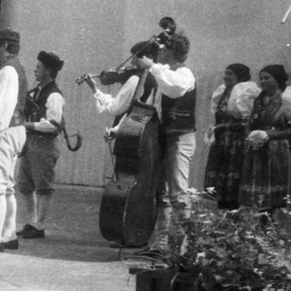 Traditional folk dance with live band.