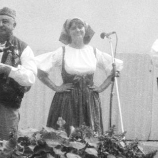 Traditional folk musicians performing outdoors.