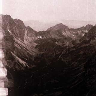 Majestic mountain range with steep valleys.