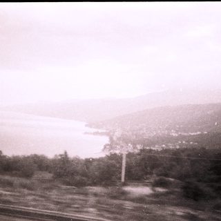 Scenic view of lake and distant mountains.