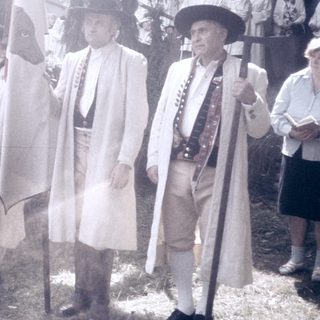 Historic reenactors in colonial-era attire.