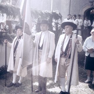Historic reenactors in colonial-era attire.