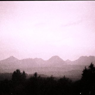 Mountain range with misty peaks.