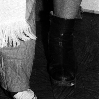 Young child dressed warmly in winter attire.