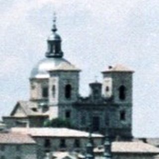 Historic cityscape with prominent cathedral and old architecture.