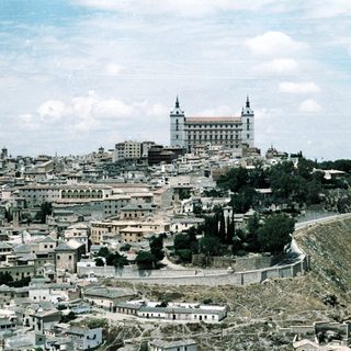 Historic cityscape featuring Toledo’s Alcázar and cathedral.