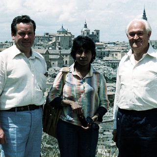 Three people posing together in Toledo, Spain.