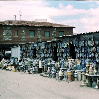 Ceramic market stall with pottery and tiles.