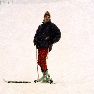 Person skiing in snowy, open terrain.