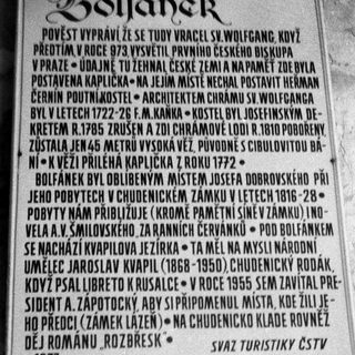 Historical plaque about Bolšánek village and its church history.