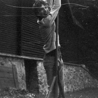 Traditional nighttime kite-flying activity outdoors.