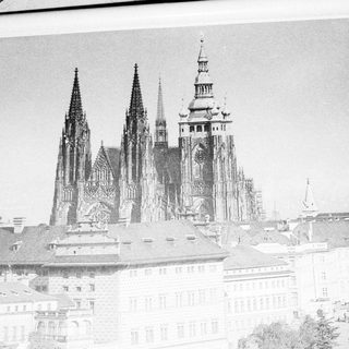 Gothic cathedral with twin spires and central tower.