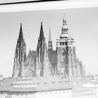 Gothic cathedral with twin spires and central tower.