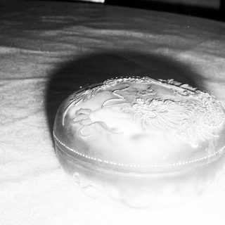 Elegant engraved silver-plated dish with floral and leaf design.