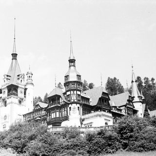 Historic castle with tall towers and ornate architecture.