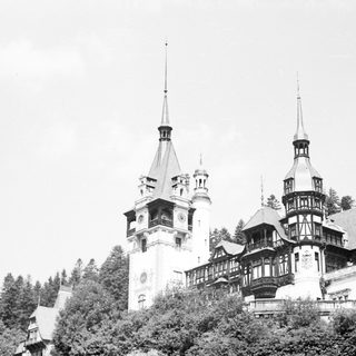 Historic castle with tall towers and ornate architecture.