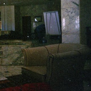 Marble interior with dim lighting, modern bathroom.