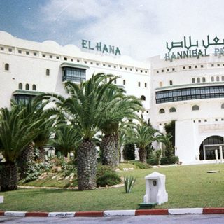 "Hannibal Palace hotel with Arabic signage."