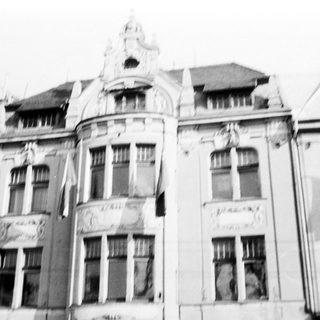 Historic European building facade with ornate architectural details.