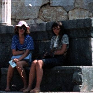 Ancient Greek ruins with standing columns.