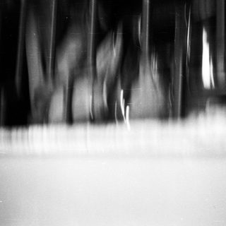 Blurred motion of falling rain.
