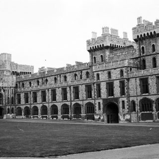 Historic castle-like building with fortified architecture.