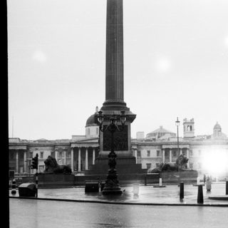 Trafalgar Square with Nelson's Column and statue.