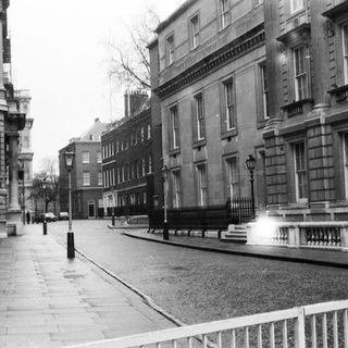 Urban street scene with historic buildings.