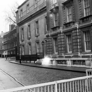 Urban street scene with historic buildings.