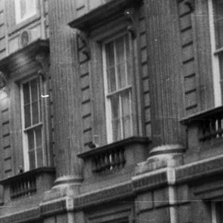 Urban street scene with historic buildings.