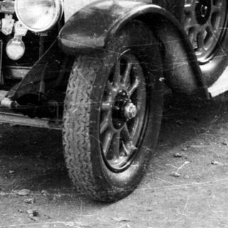 Vintage race car, numbered 12, early 20th century.
