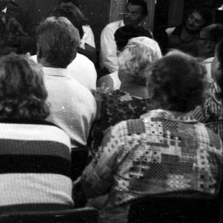 Indoor lecture or presentation with audience.
