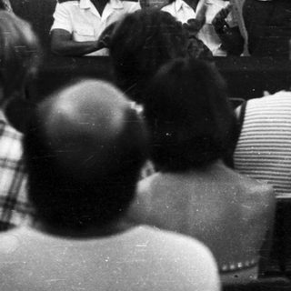 Indoor lecture or presentation with audience.