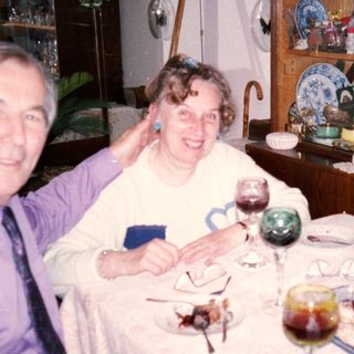 Happy couple enjoying a festive meal together.