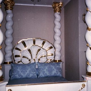 Elaborate synagogue ark with ornate seashell motif.