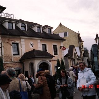 People gathered outside a hotel during an event.