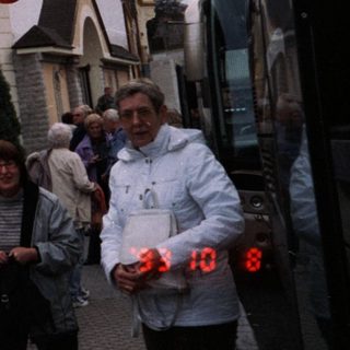People gathered outside a hotel during an event.