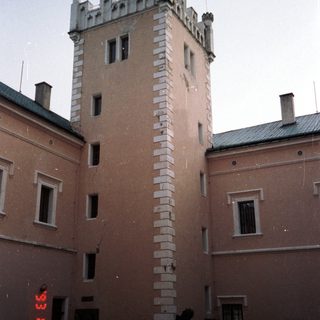 Historic building with medieval-style tower.