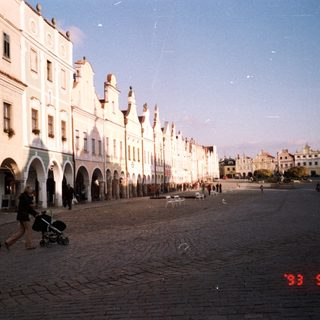 Historic European town square with Renaissance-style buildings.