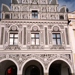 Baroque-style ornate building facade with intricate carvings.