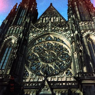 Gothic cathedral facade with intricate rose window.