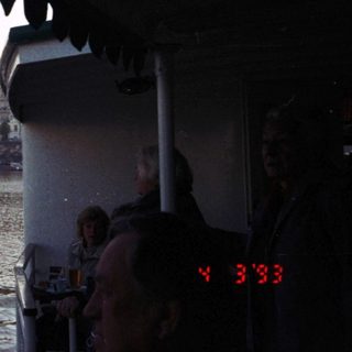 Vintage boat view of Paris bridges and river.