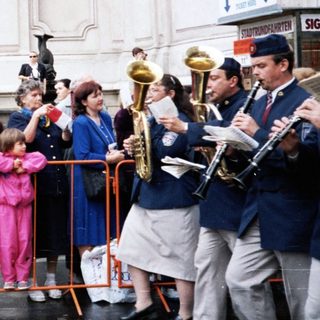 Street band performing for attentive audience.
