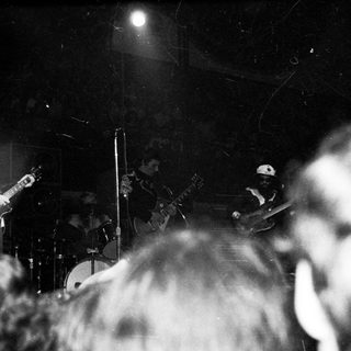 Live band performing on stage.
