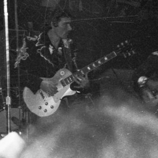 Live band performing on stage.