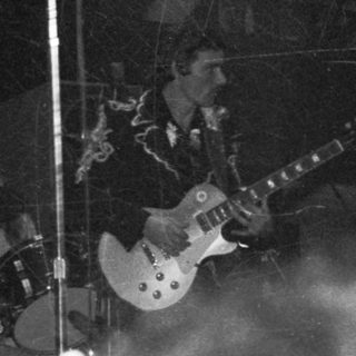 Live band performing on stage.